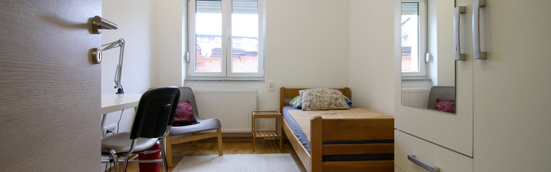 The image shows one of the bedrooms in Apt Ilica.